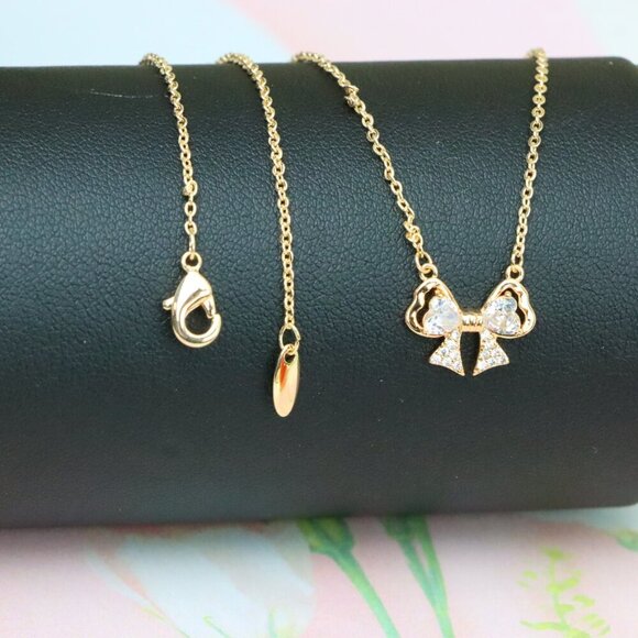 ✔ACCEPT OFFER Jewelry - "Rose Gold Bow Necklace with Heart-Shaped Crystals and Pavé Detail, XPNL1888